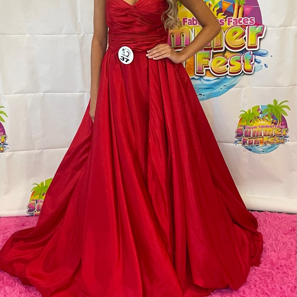 Tarik Ediz Strapless Red Ball Gown with over skirt
No tags inside dress